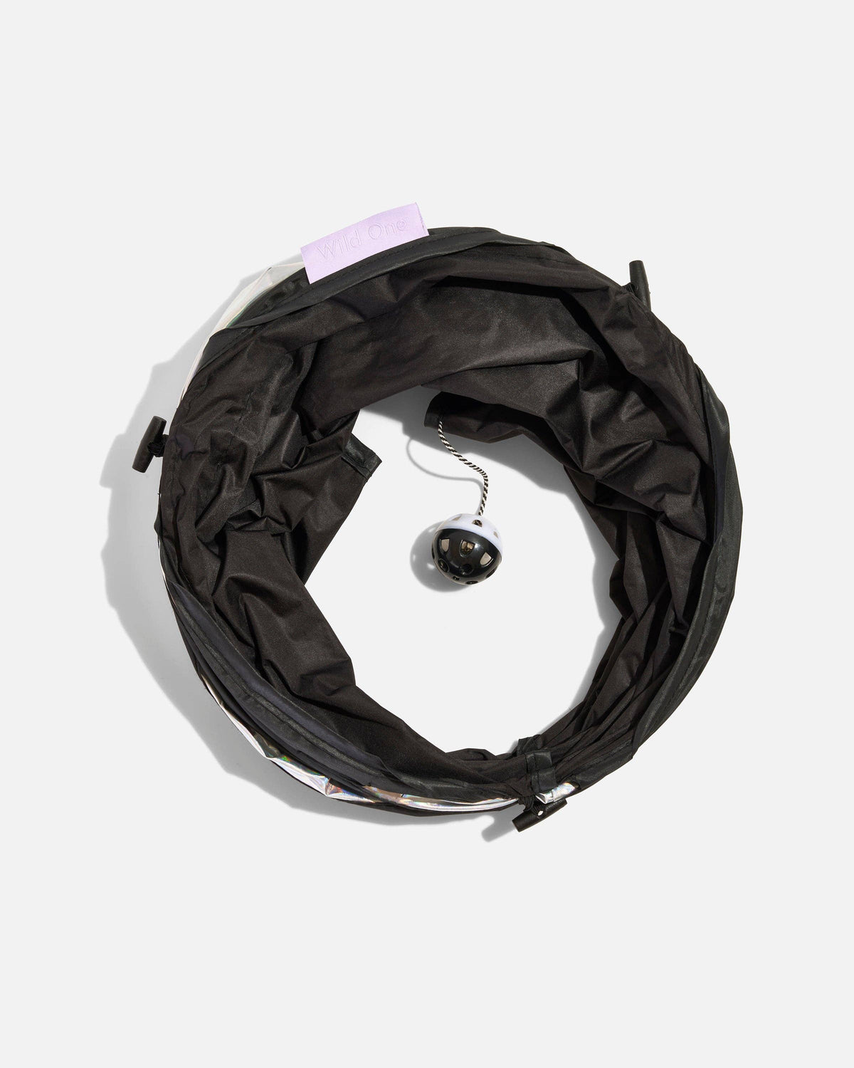 Black interior and hanging ball of the folded Wild One Cat Tunnel