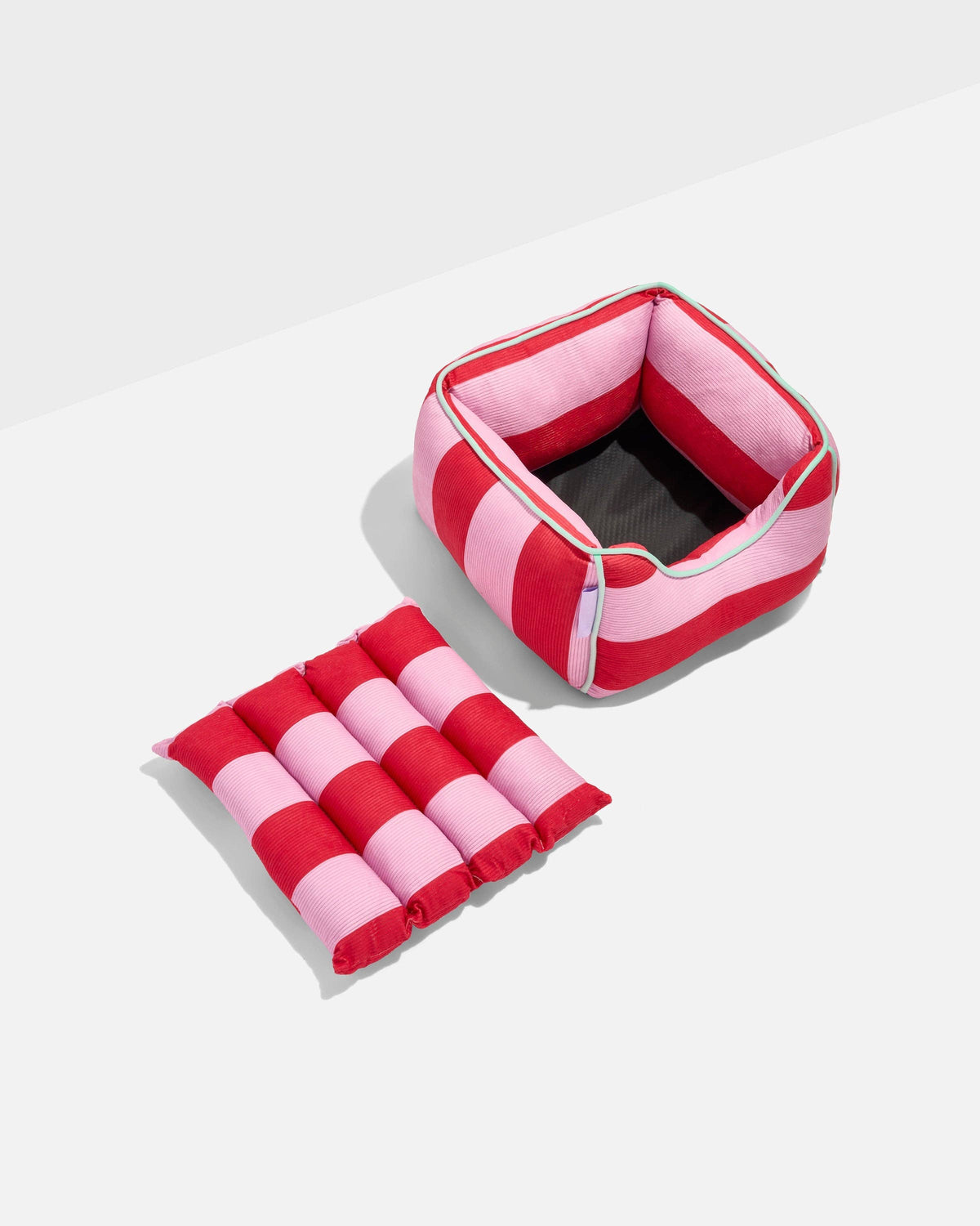Wild One Cat Bolster Bed in Bubblegum with the removable center cushion out