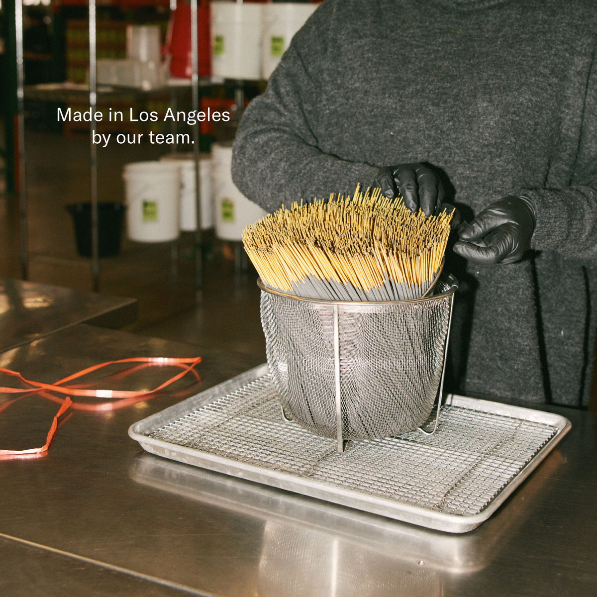 P.F. Candle Co. Incense Sticks being hand dipped at their Los Angeles factory